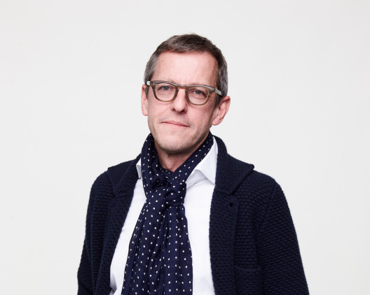 Derek Robson, glasses, scarf, cardigan, IDEO, CEO